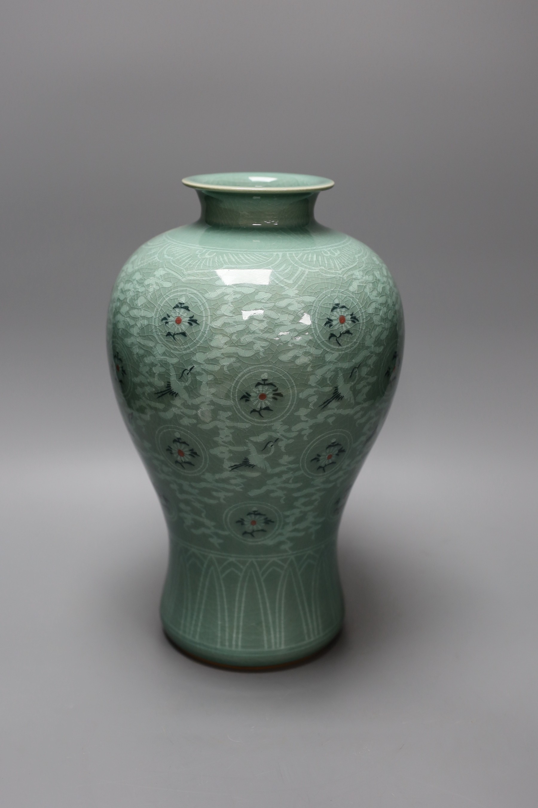 A Korean celadon ground baluster vase, 32cm